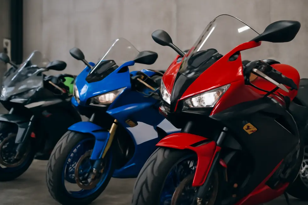 A collection of OEM motorcycle fairings on different motorbike models, showcasing variety and design.